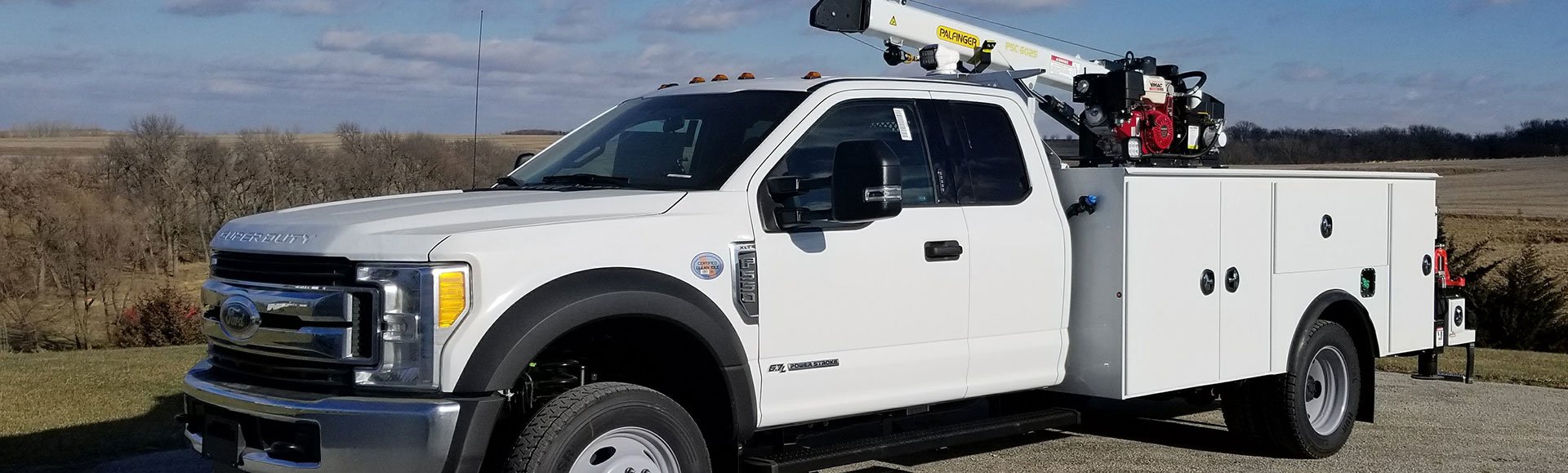 front-side-view-Ford-F550-Palfinger-Service-body-with-PSC6025-Crane