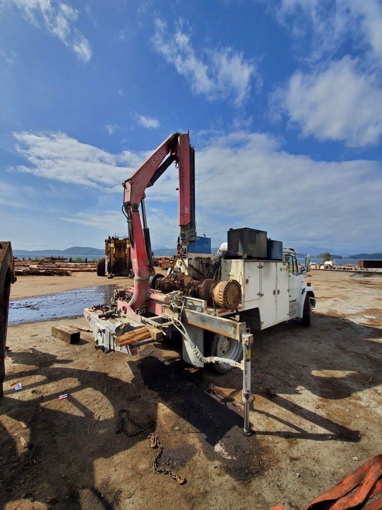 Diesel air compressor on crane service truck