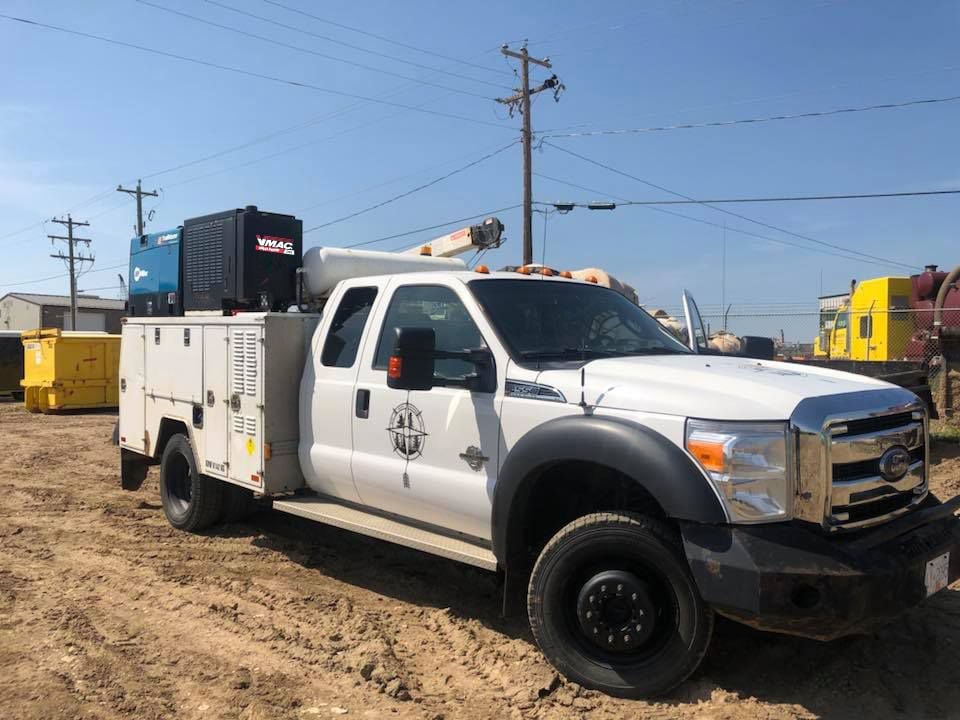 Diesel air compressor on service truck