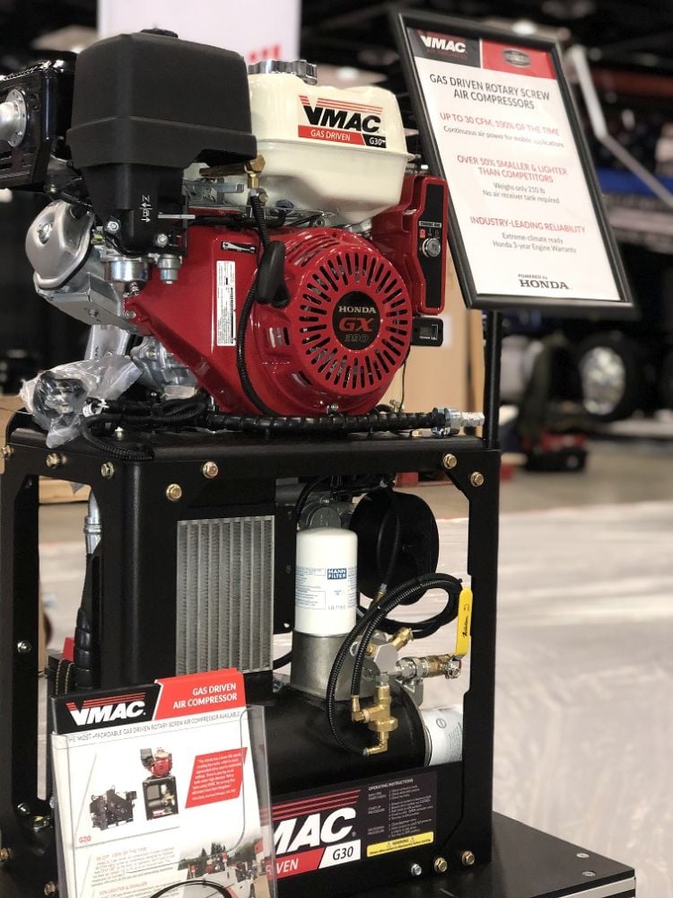 G30 stacked gas air compressor on display at a tradeshow