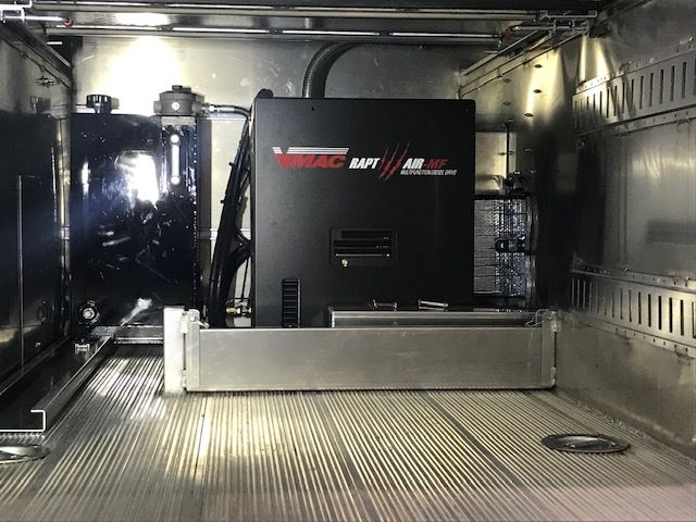 A Multifuction installed in the back of a Pride Bodies service truck