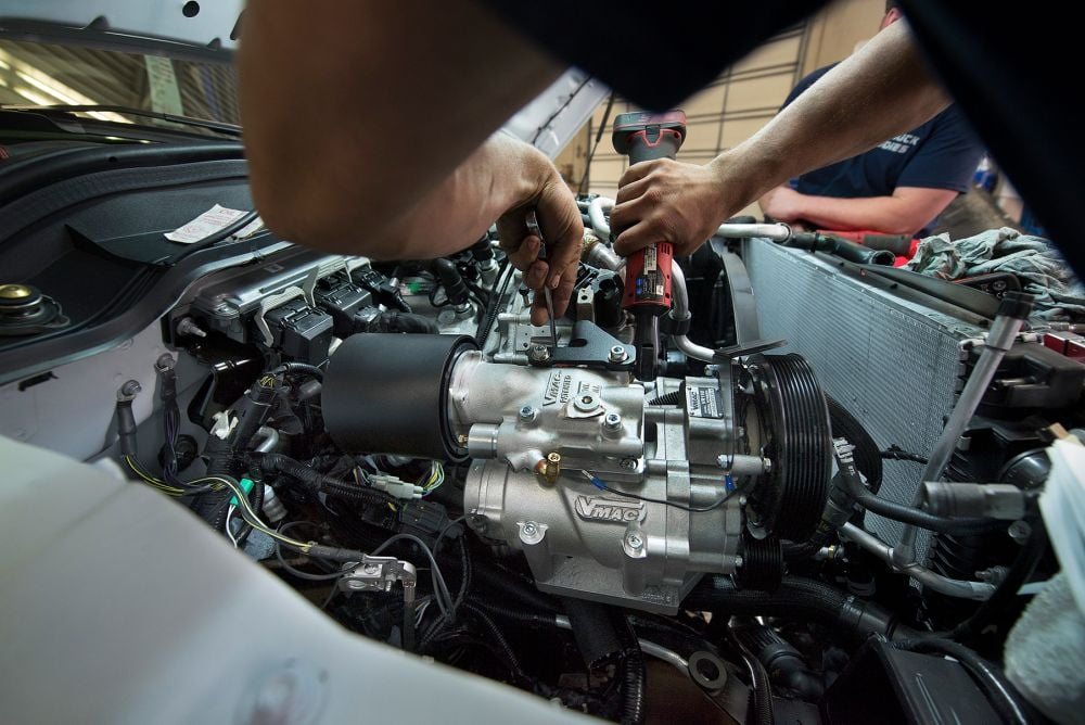 UNDERHOOD150 being installed in vehicle engine compartment