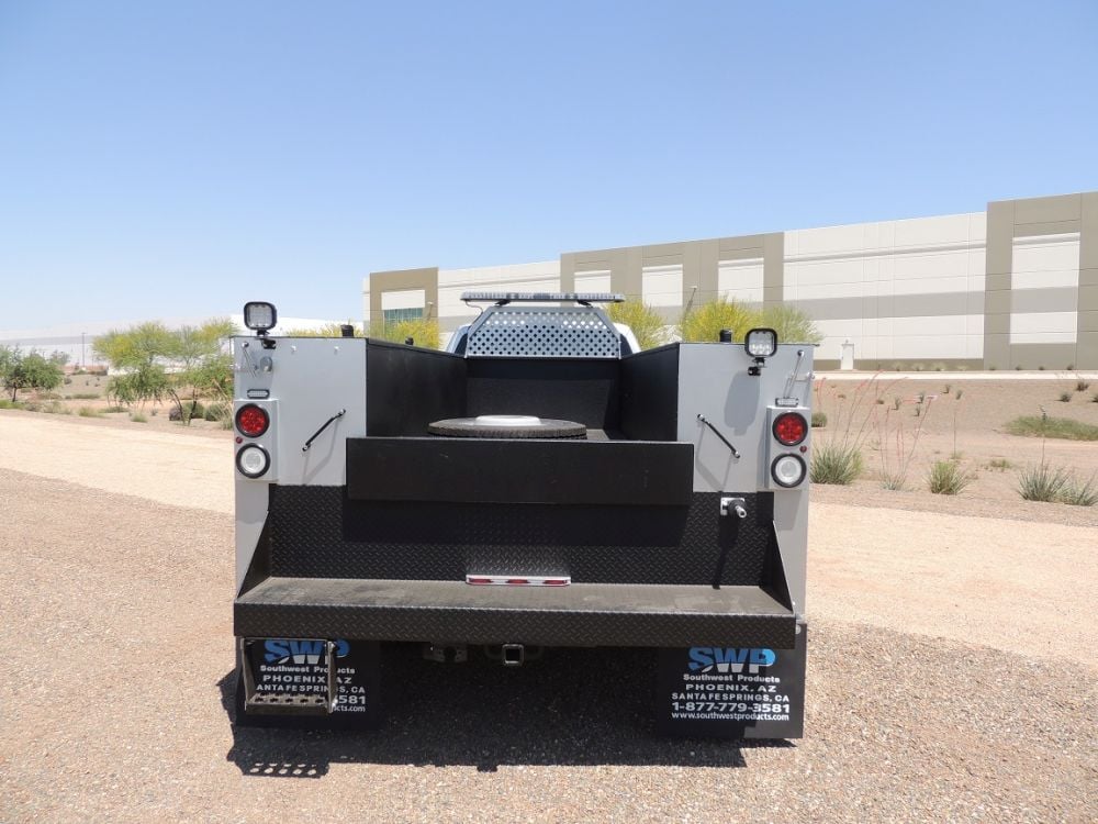 Service truck with UNDERHOOD70 shows off empty cargo bed